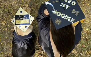 Service Dog Graduates with Master's Degree