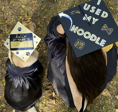 Service Dog Graduates with Master's Degree