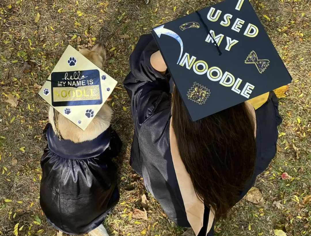 Service Dog Graduates with Master's Degree